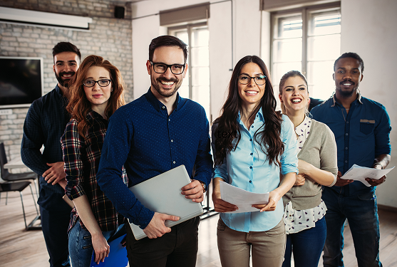 A group of employees is looking at you